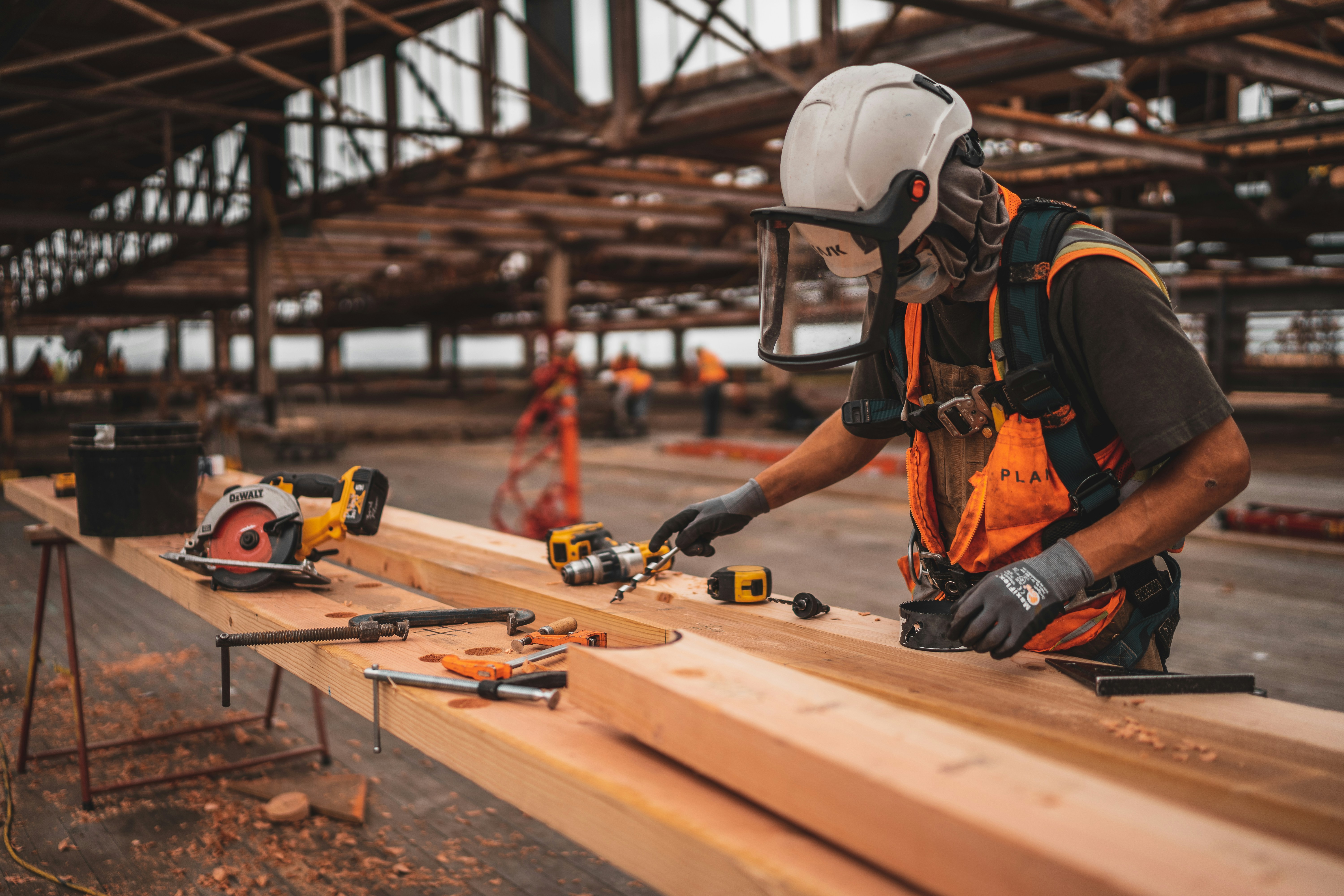 Man working on site with tools around home